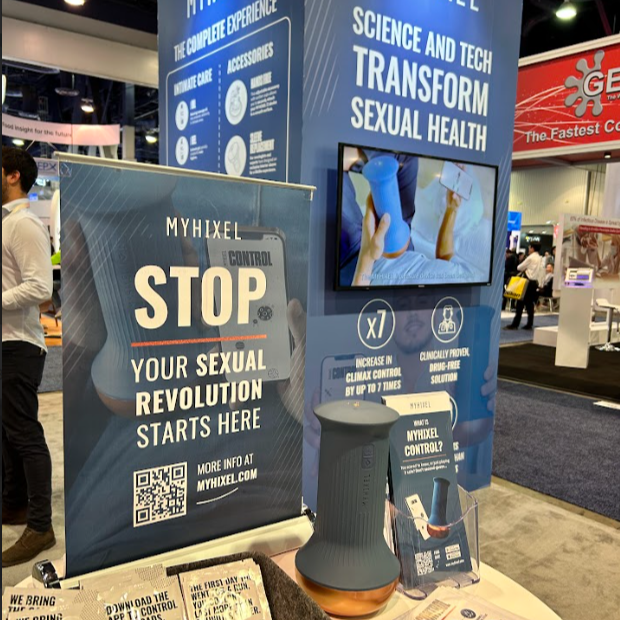 MYHIXEL booth at CES 2024 showcasing sexual health innovation with product display, bold claim ‘Stop. Your Sexual Revolution Starts Here’ and science-driven branding